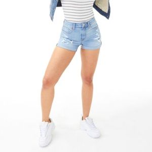 000 shorts made from recycled plastic bottles to minimize waste production